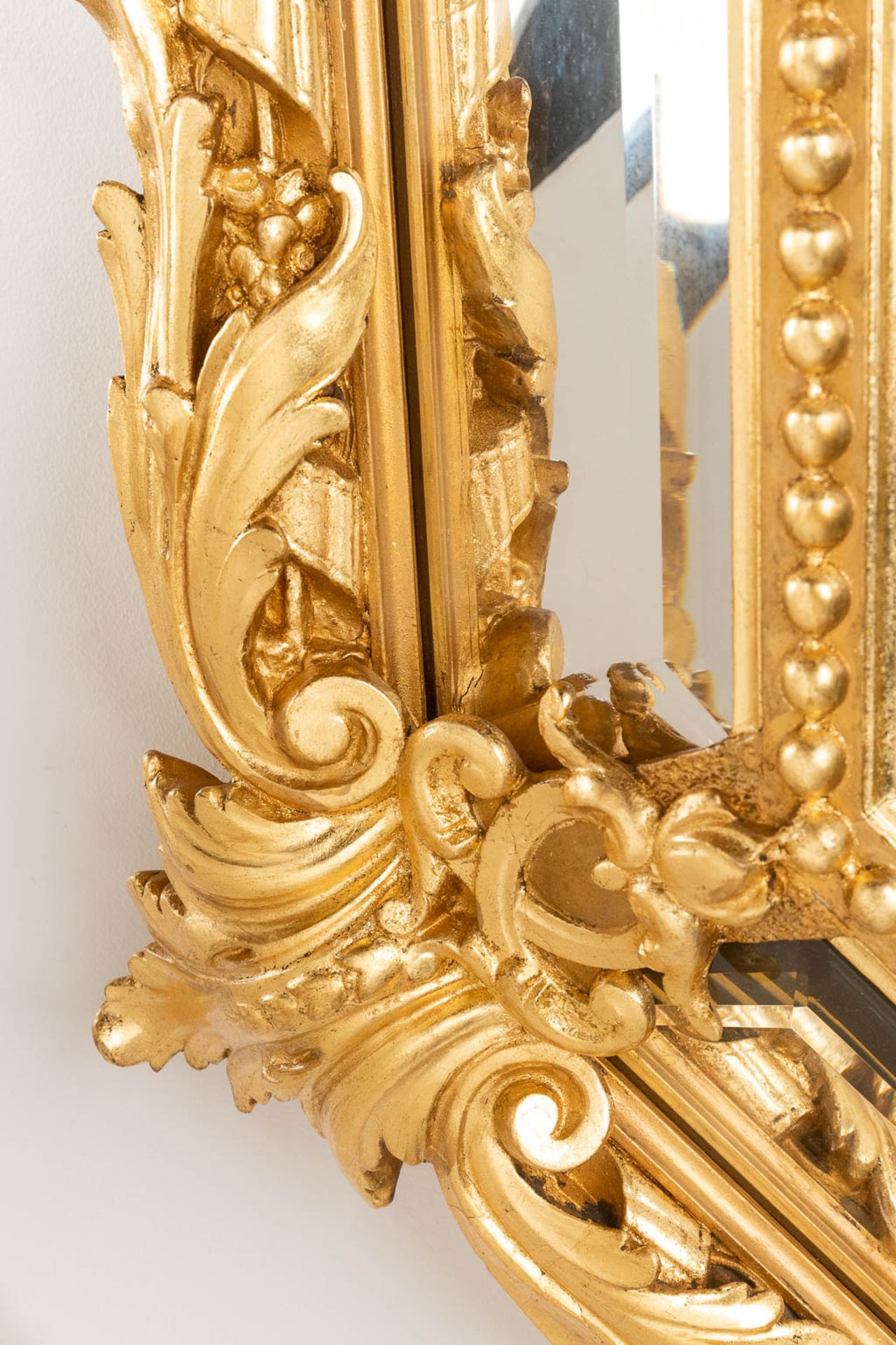 An antique mirror, sculptured gilt stucco and facetted glass, Louis XV style. 19th C. (W:98 x H:140  - Bild 6 aus 9