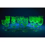 25 pieces of Uranium Glass goblets, of which some are Val Saint Lambert. (H:13 cm)