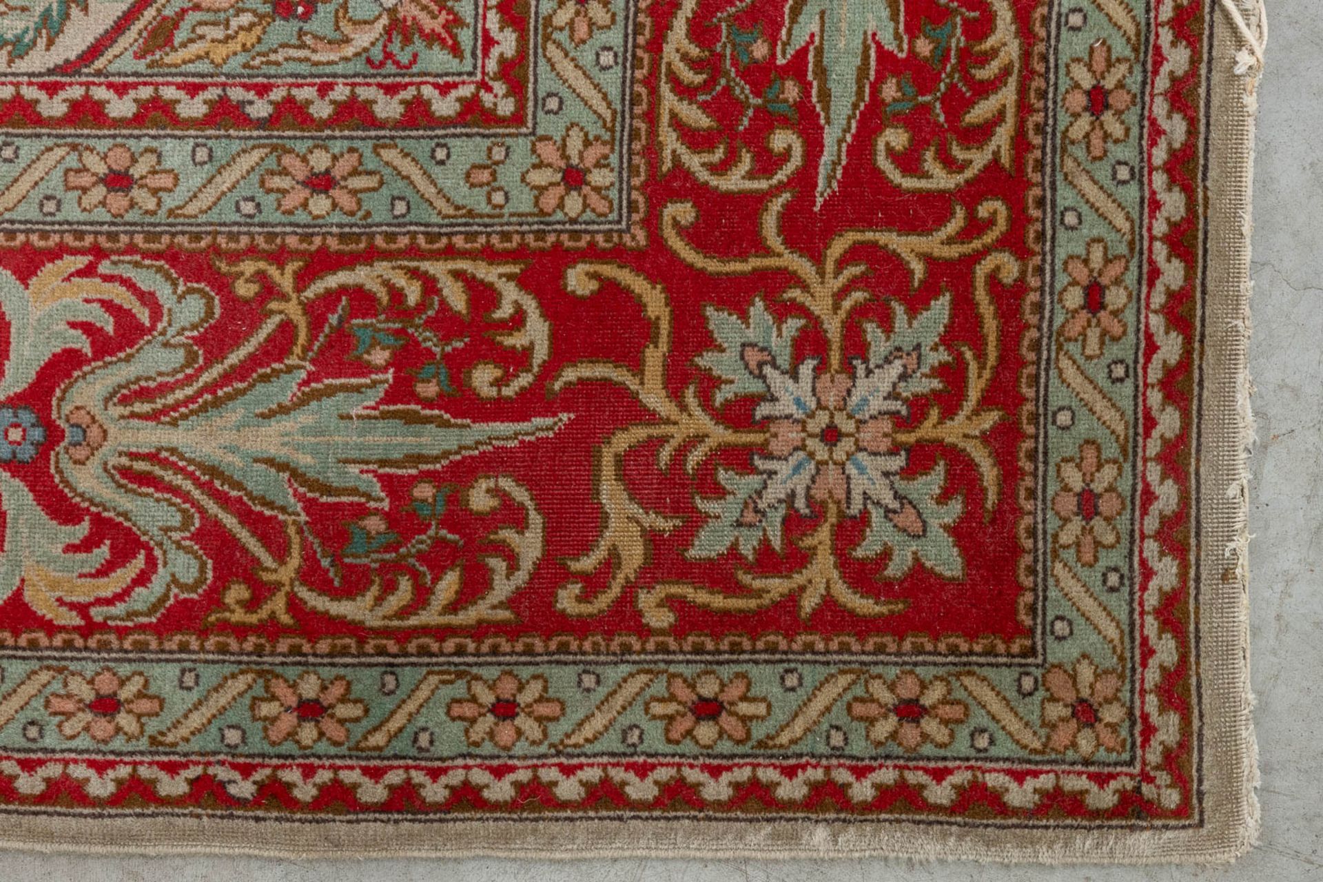 An Oriental hand-made carpet, Tabriz. (D:354 x W:254 cm) - Image 11 of 12