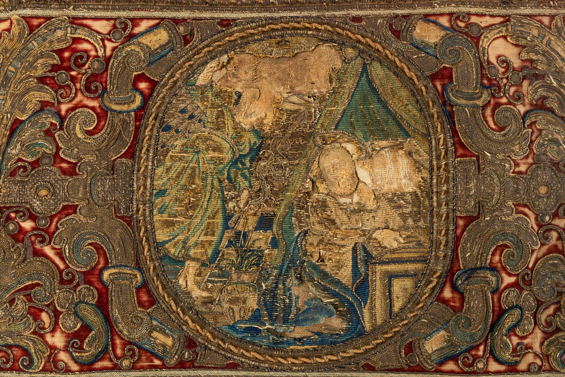 An antique altar textile, Thick embroideries and religious images. 17th C. (D:255 x W:28 cm) - Image 4 of 12