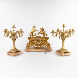 A three-piece mantle garniture clock and candelabra, polished bronze. 20th C. (D:18 x W:46 x H:43 cm