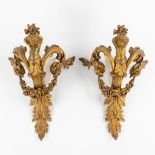 A pair of gilt bronze wall lamps, decorated with putti. Louis XV style. 19th C. (D:20 x W:33 x H:48