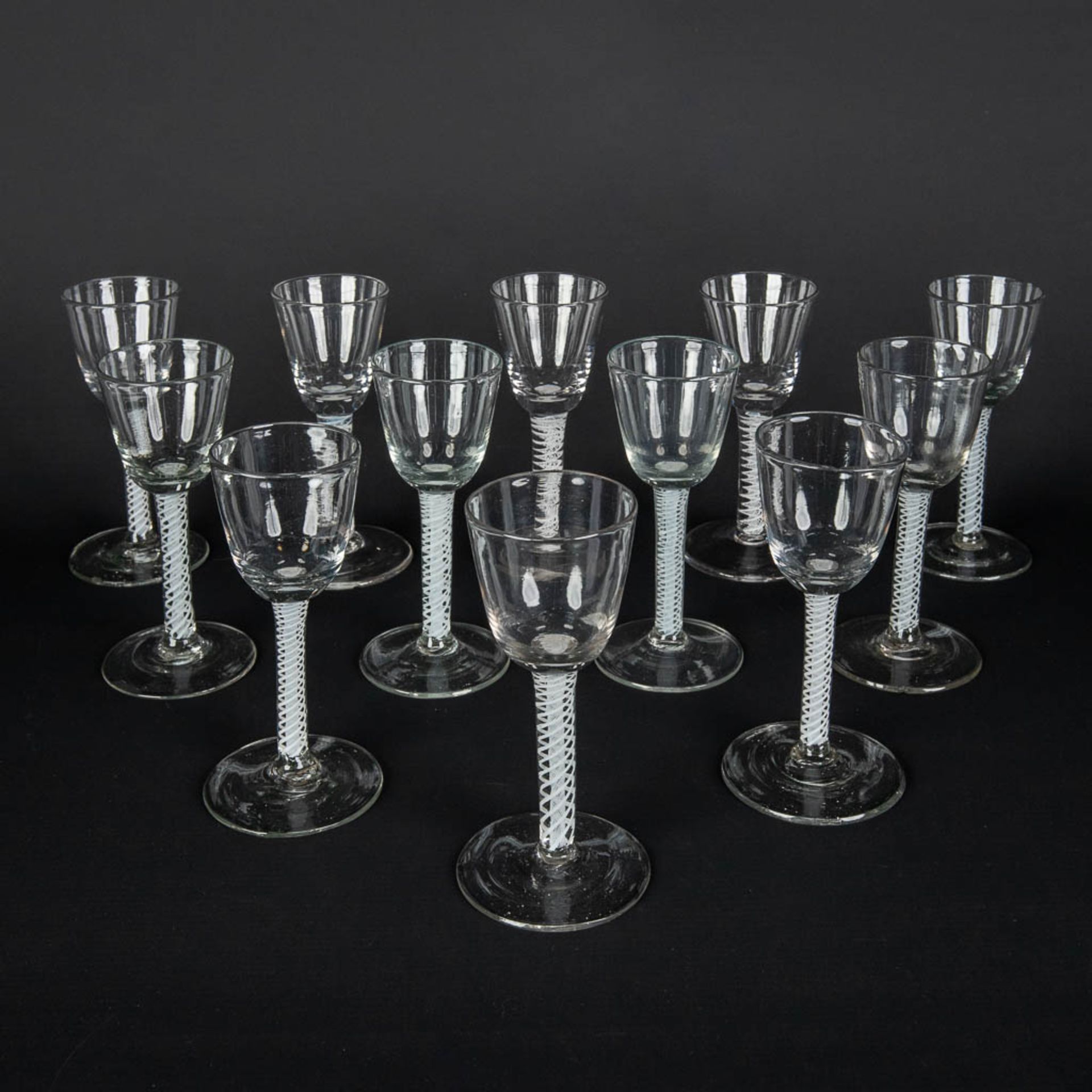 Twelve 'Twisted stem', hand-made glasses or goblets, Late 18th, early 19th C. (H:15 x D:7,5 cm)