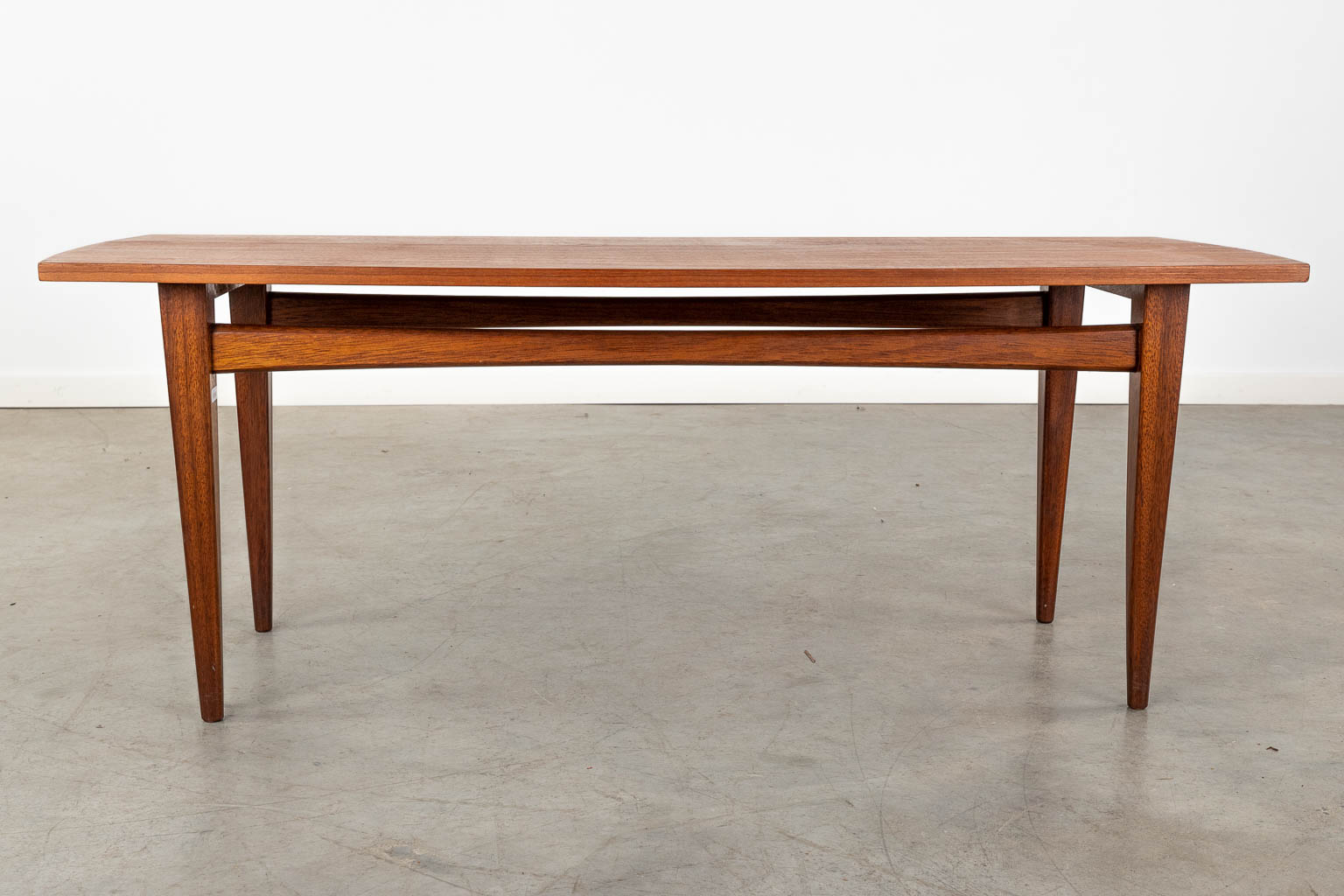 A mid-century Scandinavian coffee table, probably solid teak. (D:50 x W:120 x H:45 cm) - Image 5 of 10