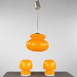 Two mid-century nightlamps and a ceiling lamp, orange glass on metal, circa 1970. (H:65 x D:30 cm)