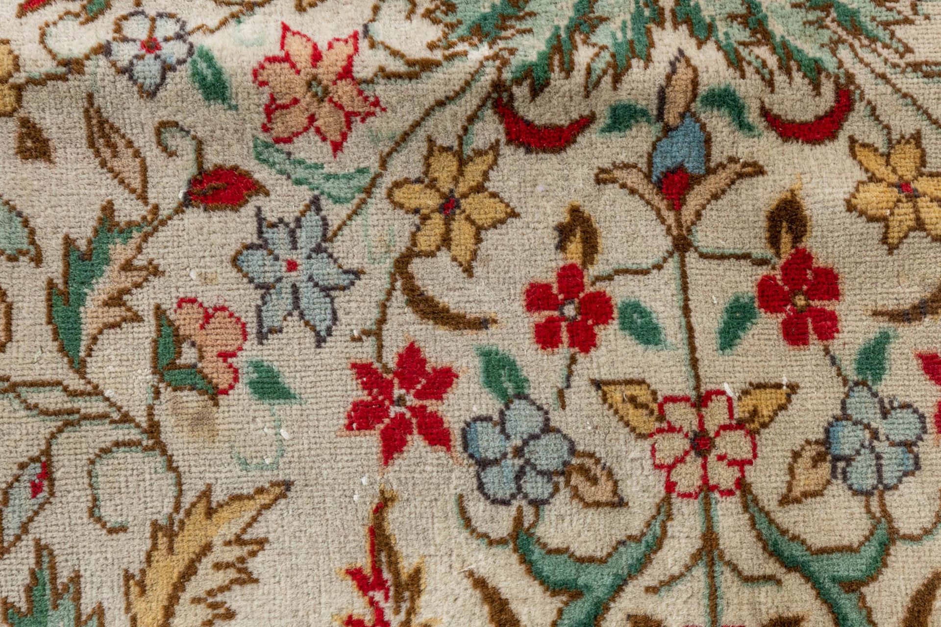 An Oriental hand-made carpet, Tabriz. (D:354 x W:254 cm) - Image 8 of 12