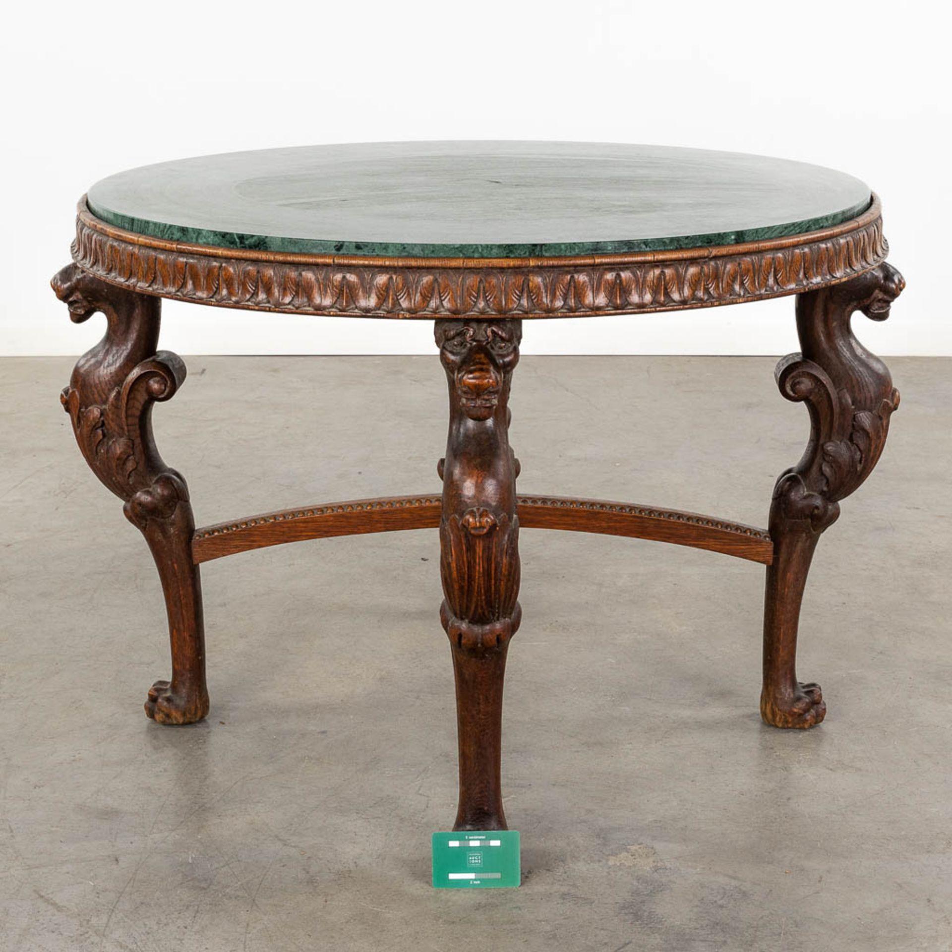 A wood-sculptured coffee table, mythological figurines and a green marble top. 20th C. (D:93 x W:93  - Bild 2 aus 13