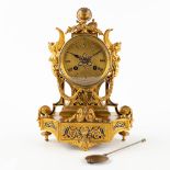 A small mantle clock, bronze decorated with enamel, angels and a globe. 19th C. (D:12,5 x W:20 x H:2