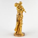 A mother with her child, ormolu gilt bronze. 19th C. (D:12 x W:15 x H:36 cm)