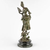 Elegant lady with a fan' a figurine, patinated bronze. (H:55 x D:20 cm)
