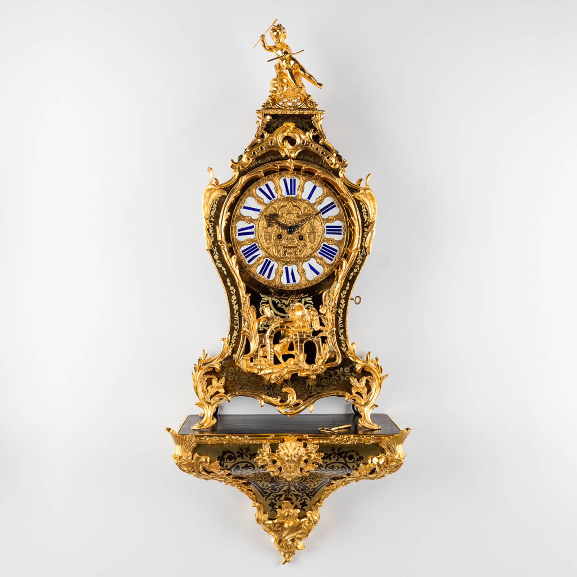 A boulle Cartel clock on a console, tortoiseshell and copper inlay, Napoleon 3, 19th C. Lefaucheur &