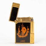 S.T Dupont, Columbus 1492, a lighter, gold-plated metal. (D:1,1 x W:3,7 x H:5,5 cm)