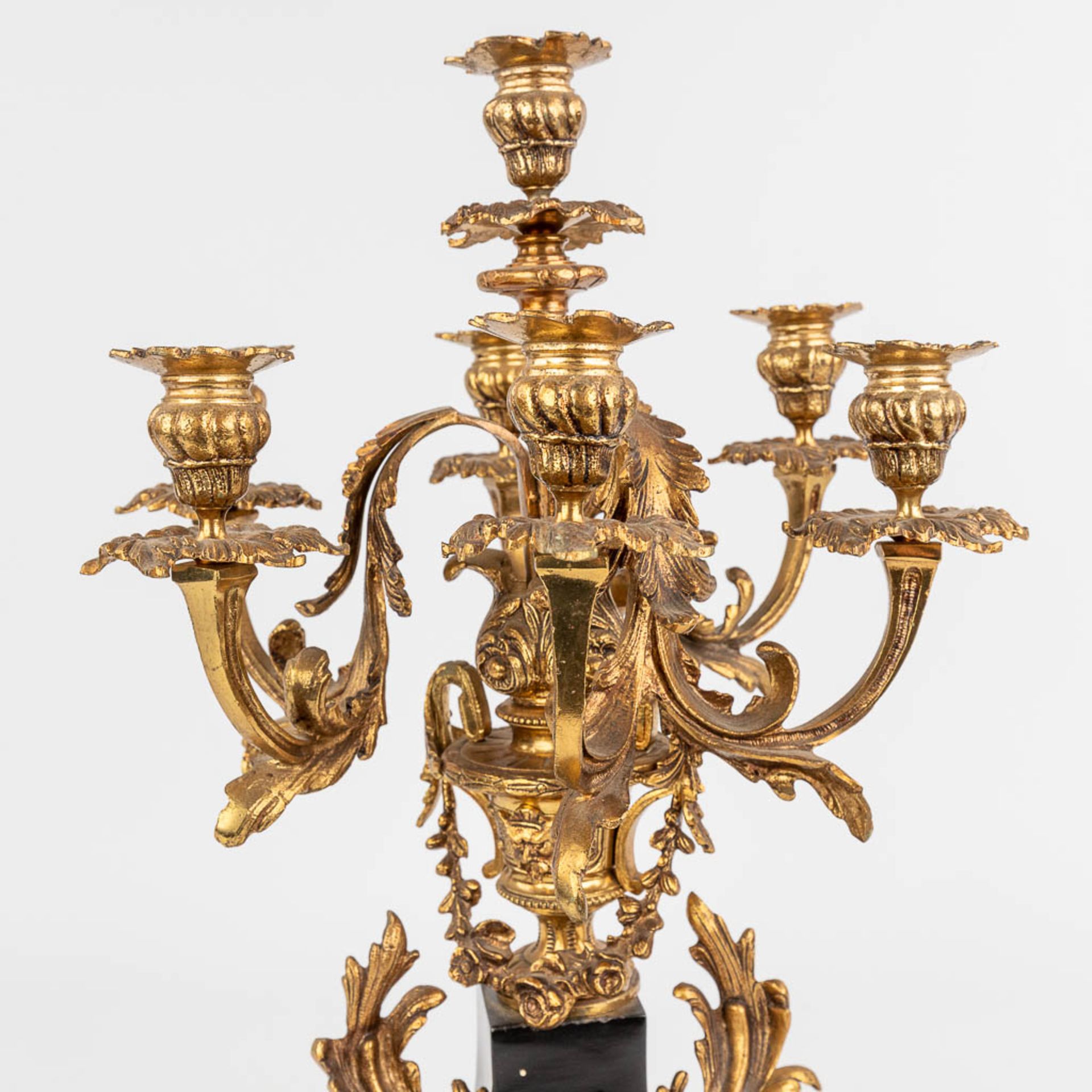 A three-piece mantle garniture clock and candelabra, Louis XV style. Circa 1970. (D:25 x W:51 x H:55 - Image 12 of 14