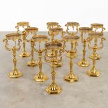 Twelve Church candlesticks. Gold-plated brass, 20th C. (H:53 x D:23 cm)