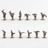 12 figurative animal place or menu card holders, silver-plated bronze. (H:5 cm)