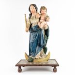 A patinated wood statue of Madonna with a child, Serpent and Crescent moon, 17th/18th C. (D:38 x W:5