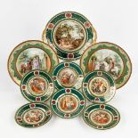 Vienna Porcelain, a set of 9 plates with printed decor. 20th C. (D:25 x W:27 cm)