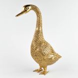 A large figurative goose, gold-plated metal. 20th C. (D:15 x W:35 x H:49,5 cm)