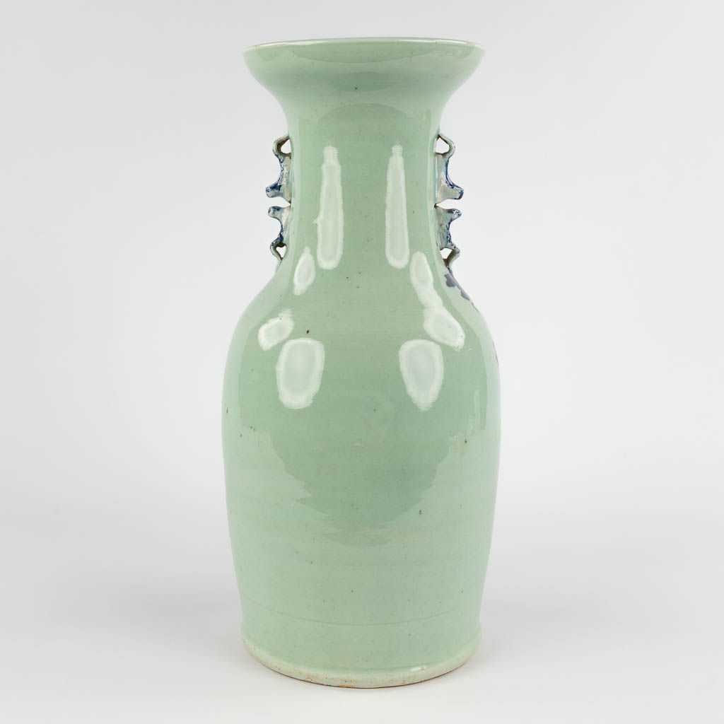 A Chinese celadon vase with blue-white decor of flora. 19th/20th C (H:42 x D:19 cm) - Image 5 of 12