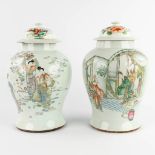 Two Chinese balustervases, polychrome decor of ladies. 19th/20th C. (H:39,5 x D:24 cm)