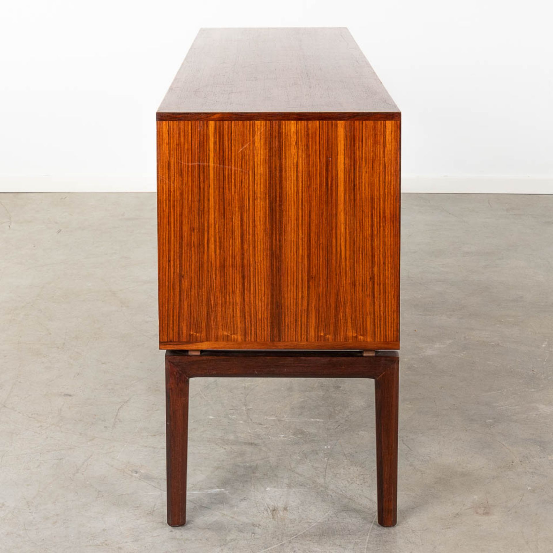 A mid-century Scandinavian Sideboard with 6 drawers, and rosewood veneer. (D:45 x W:150 x H:80 cm) - Image 7 of 12