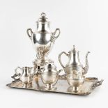 A Samovar, tea pot, sugar pot, bowl and milk jug on a silver platter, 7,120 kg. (D:41 x W:58 cm)