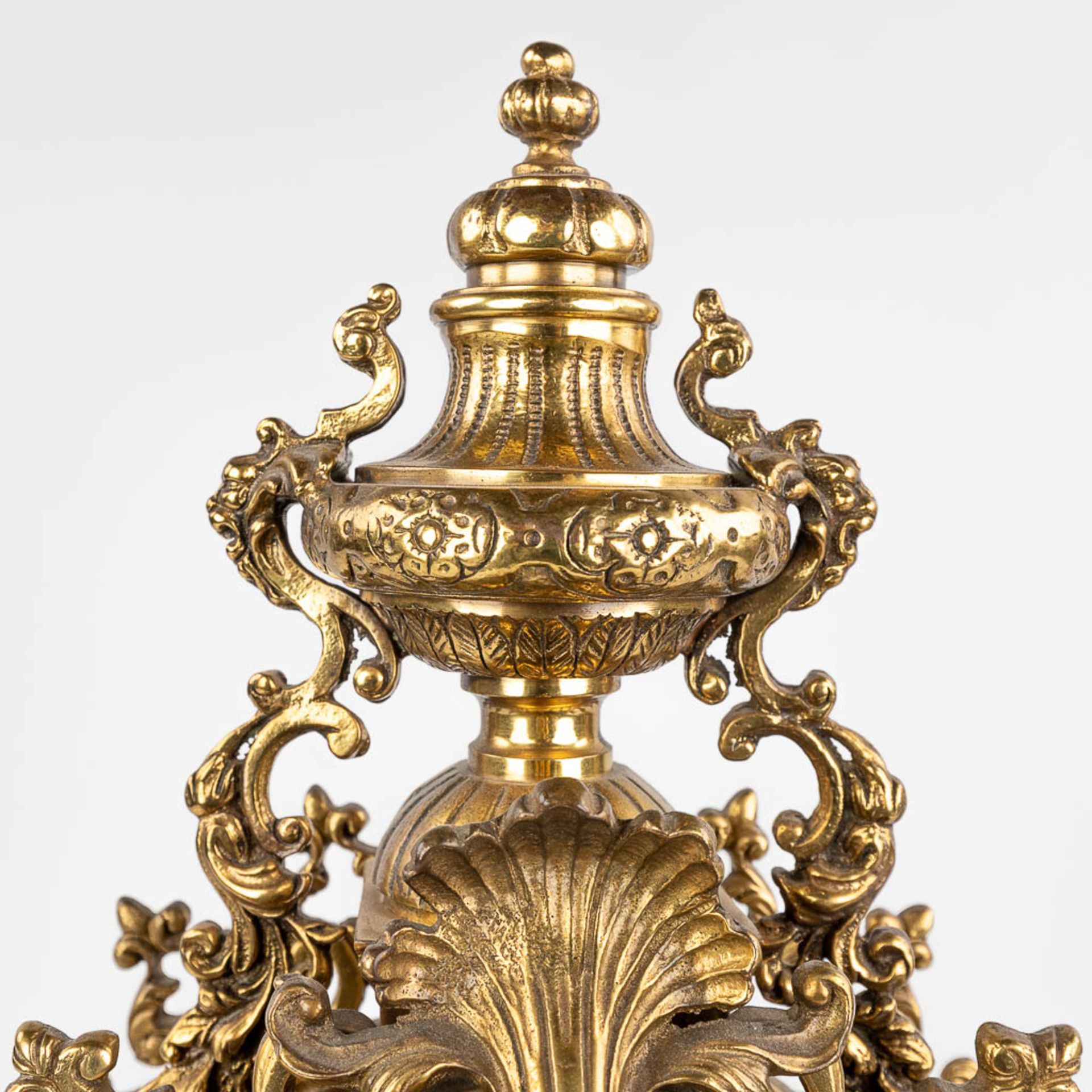 A three-piece mantle garniture consisting of a clock with candelabra, made of bronze. circa 1970. (W - Image 8 of 16