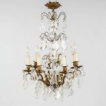 An antique French chandelier, brass with glass. 20th C. (H:77 x D:52 cm)