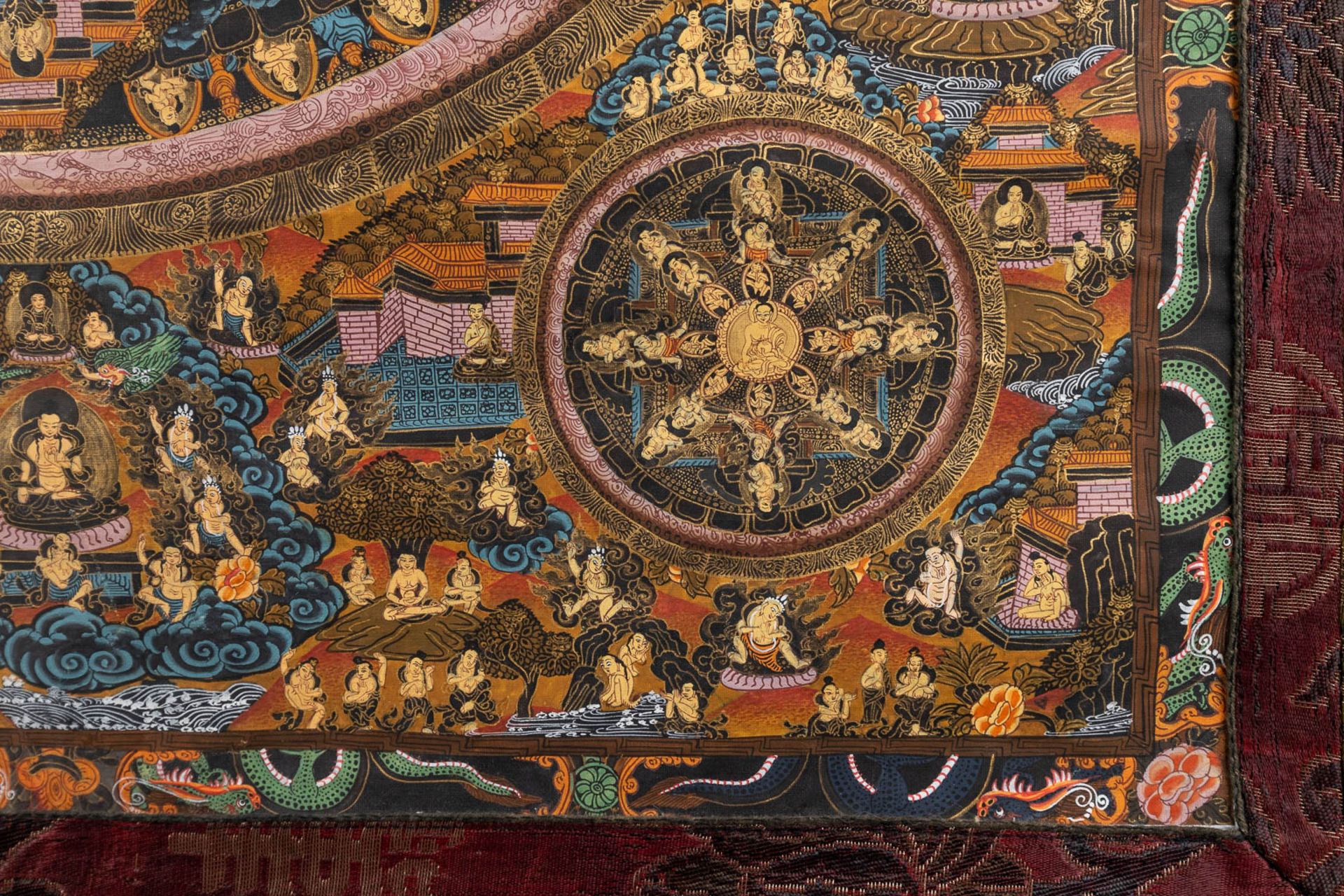An Eastern Thangka, hand-painted decor on silk. (W:57 x H:74 cm) - Image 9 of 13
