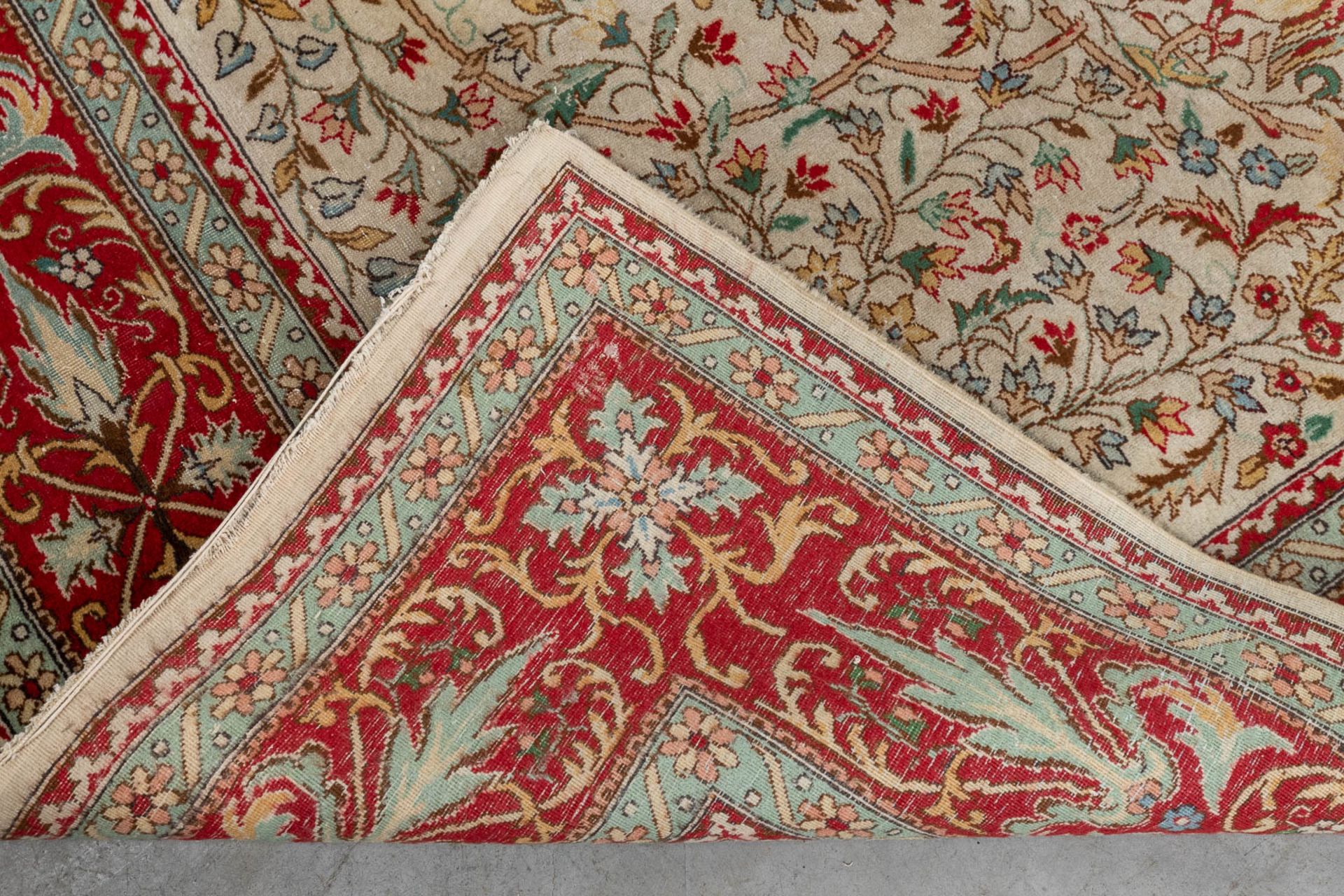 An Oriental hand-made carpet, Tabriz. (D:354 x W:254 cm) - Image 12 of 12