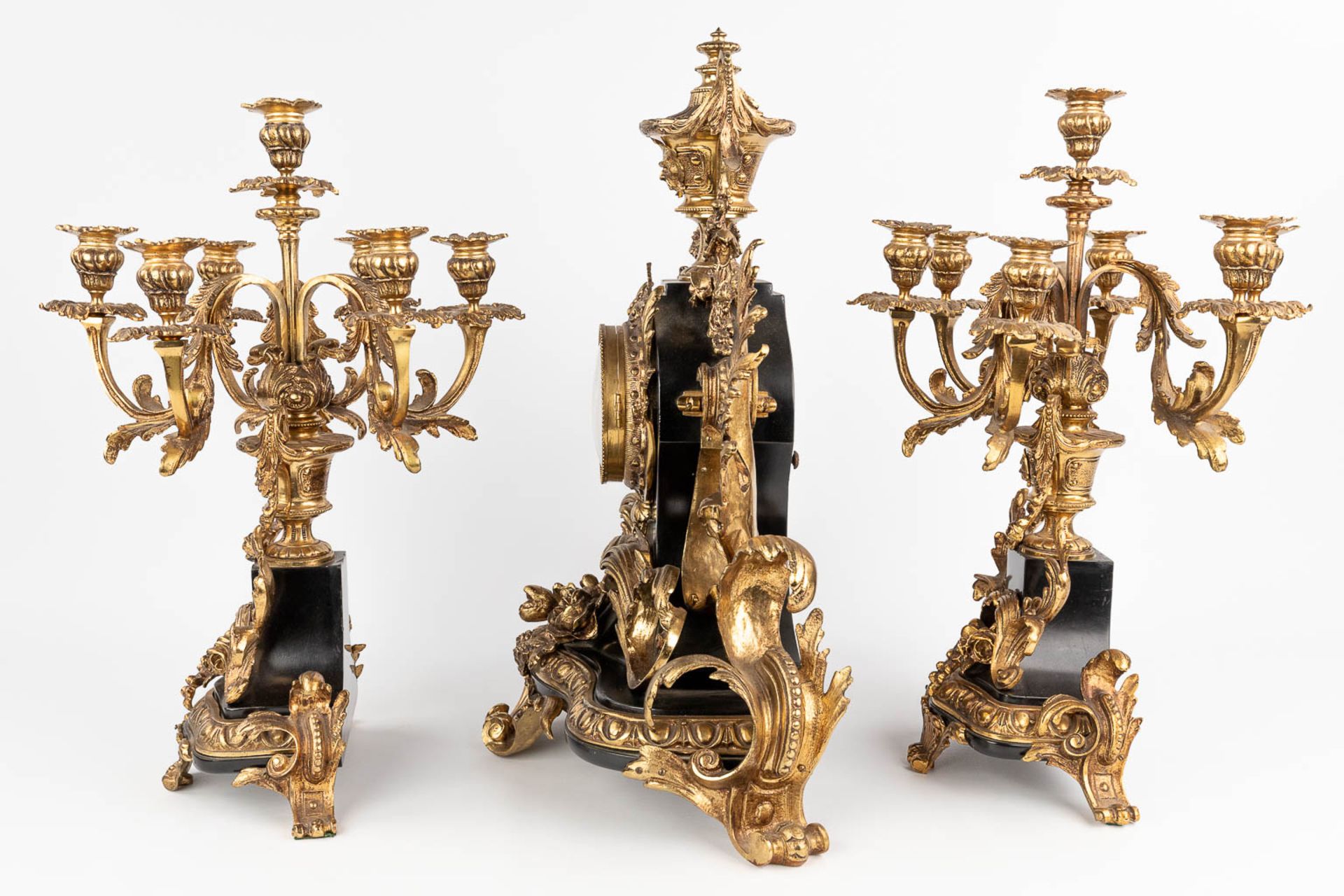 A three-piece mantle garniture clock and candelabra, Louis XV style. Circa 1970. (D:25 x W:51 x H:55 - Image 6 of 14