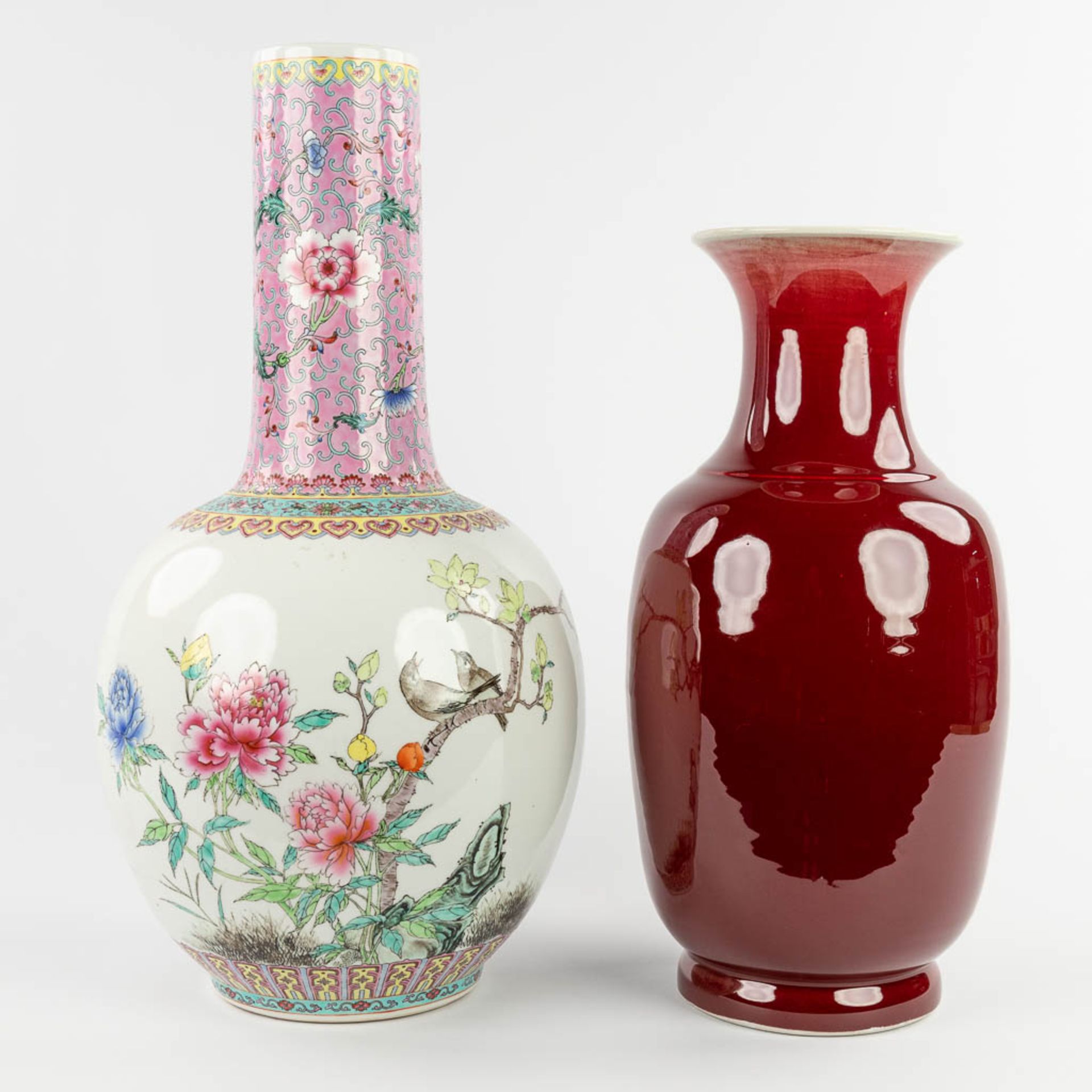 A Chinese 'Sang De Boeuf' and Famille Rose vase, 20th C. (H:57 x D:29 cm)
