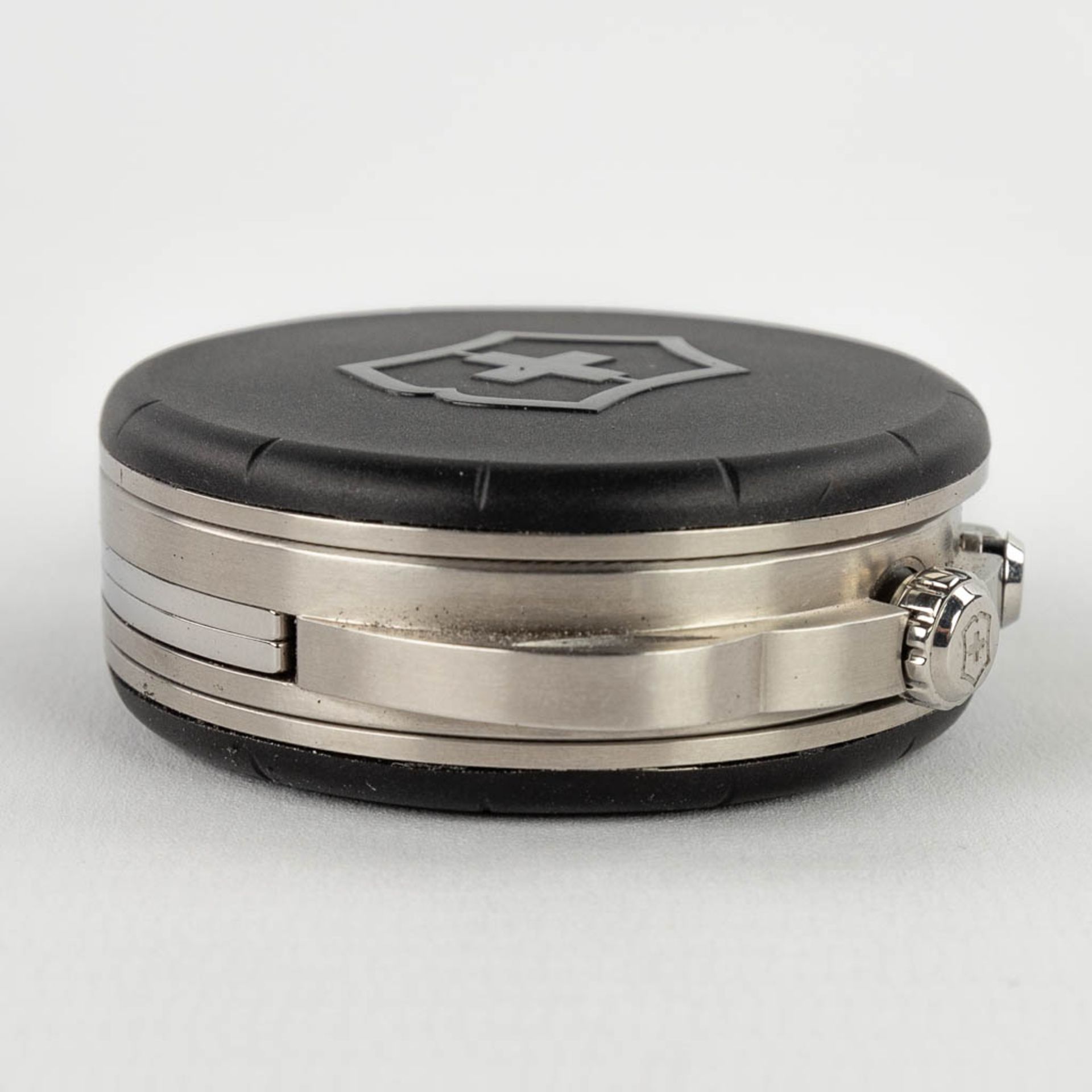 Victorinox, a travel alarm clock in the original box. Limited edition, 2010. (W:5,6 cm) - Image 11 of 16