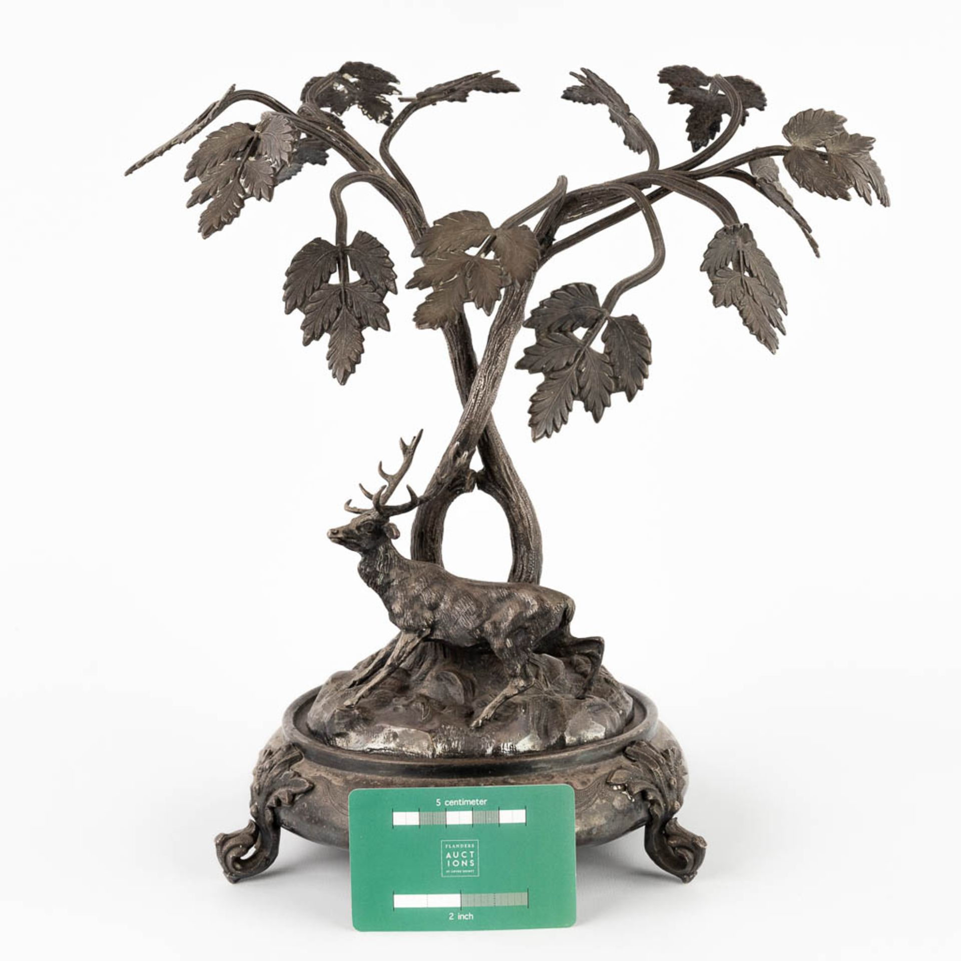 A figurine of a deer, walking under tall trees. Silver-plated bronze. Circa 1900. (D:24 x W:30 x H:3 - Image 2 of 13