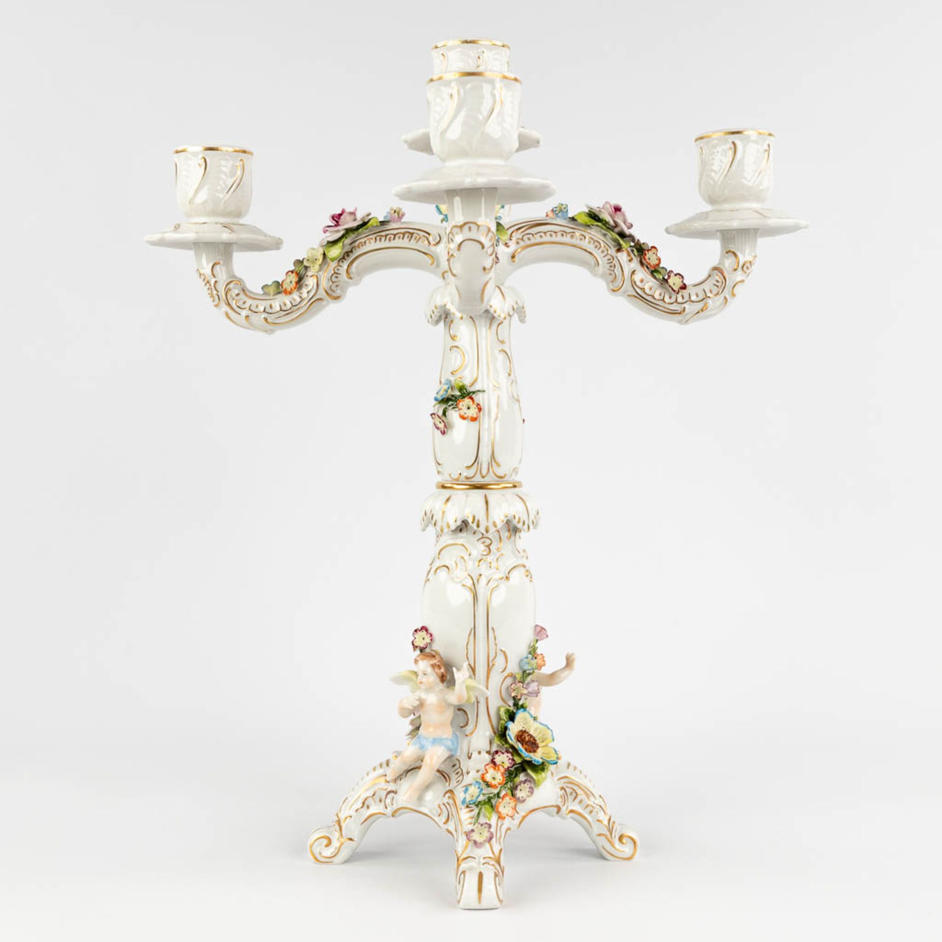 A table candle holder, porcelain decorated with flowers and putti. 20th C. (D:38 x W:38 x H:47 cm) - Bild 5 aus 22