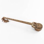 An oriental musical instrument with 6 strings, snake leather and bone inlay. 20th C. (D:13 x W:15 x