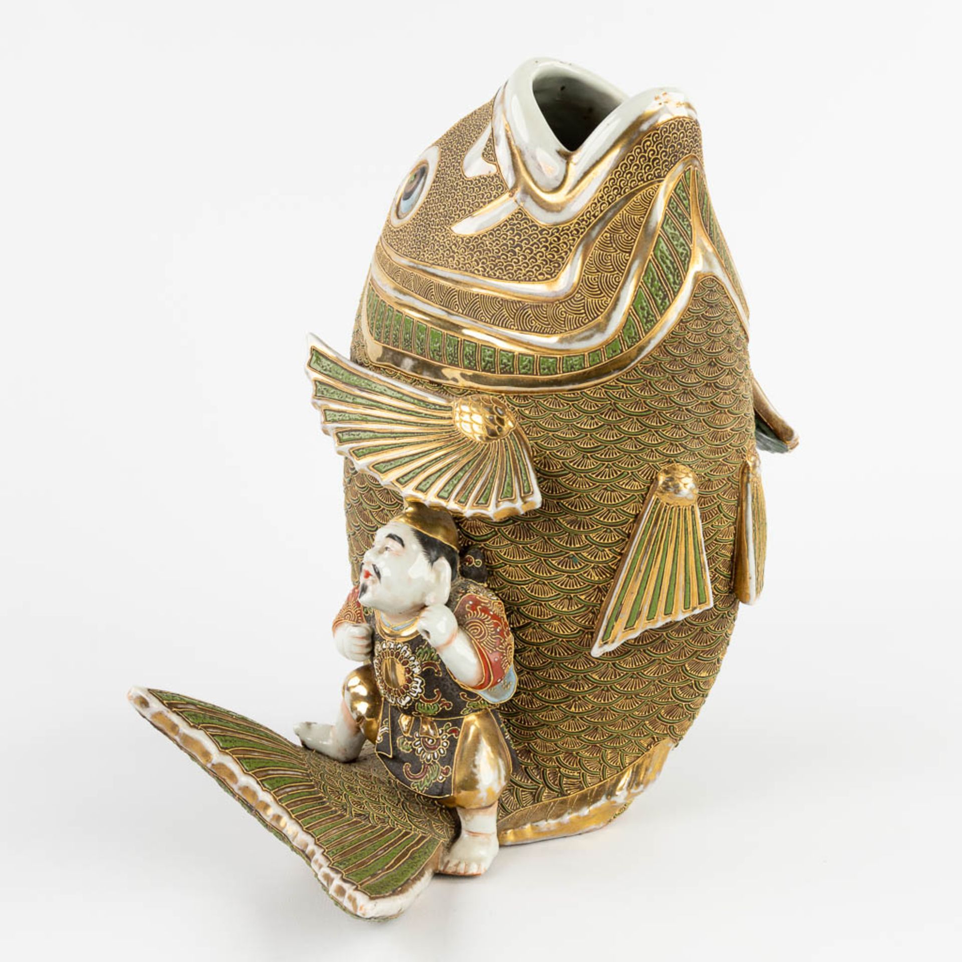 A figurine seaed on a koi, Satsuma stoneware. Meji period. (D:27 x W:26 x H:31 cm) - Image 4 of 11