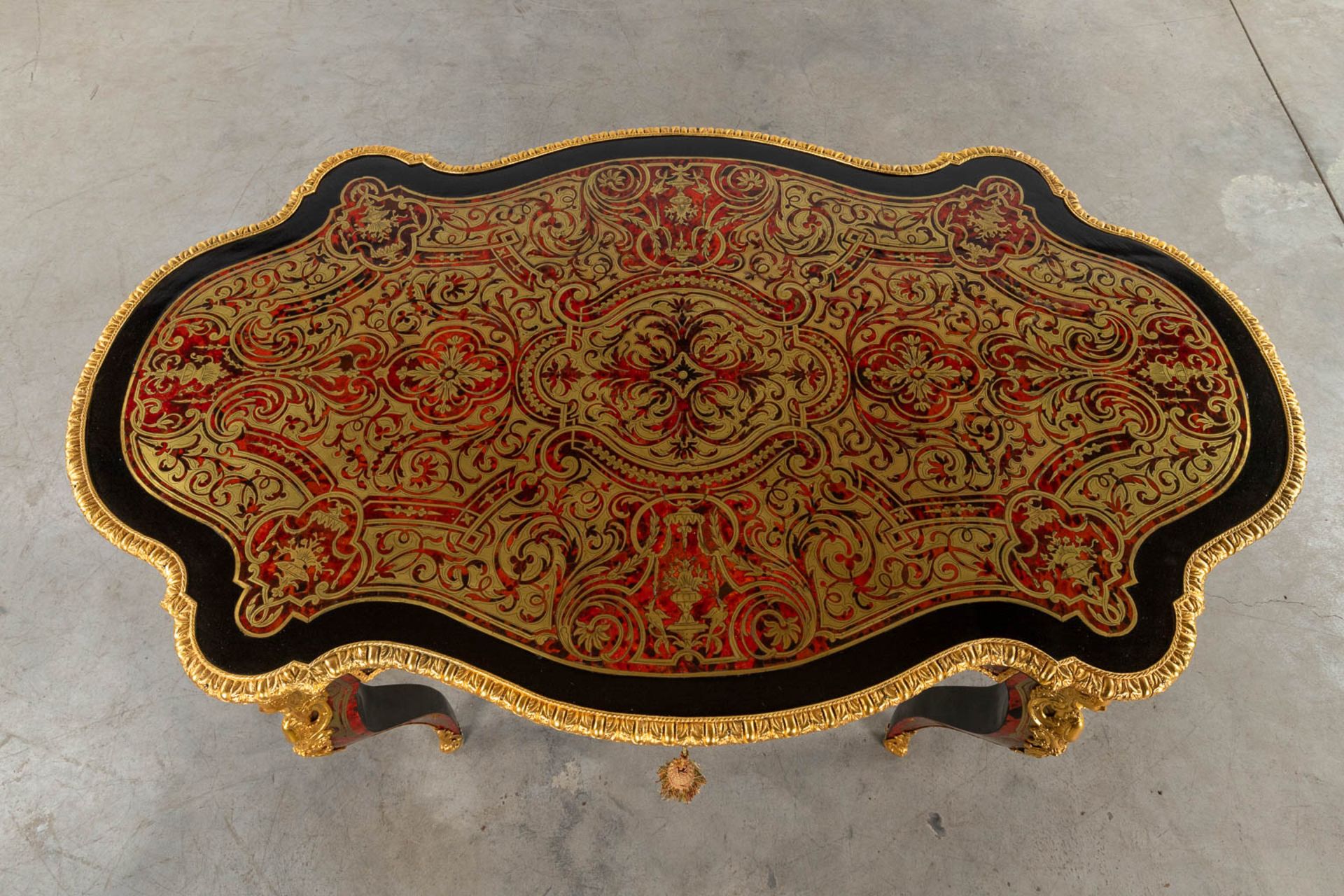 A Boulle 'Table Violon', tortoiseshell and copper inlay, Circa 1900. (D:77 x W:134 x H:77 cm) - Image 11 of 19