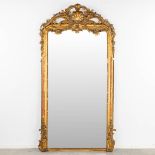 A large and antique mirror, gilt stucco in Louis XV style. 19th C. (W:130 x H:238 cm)