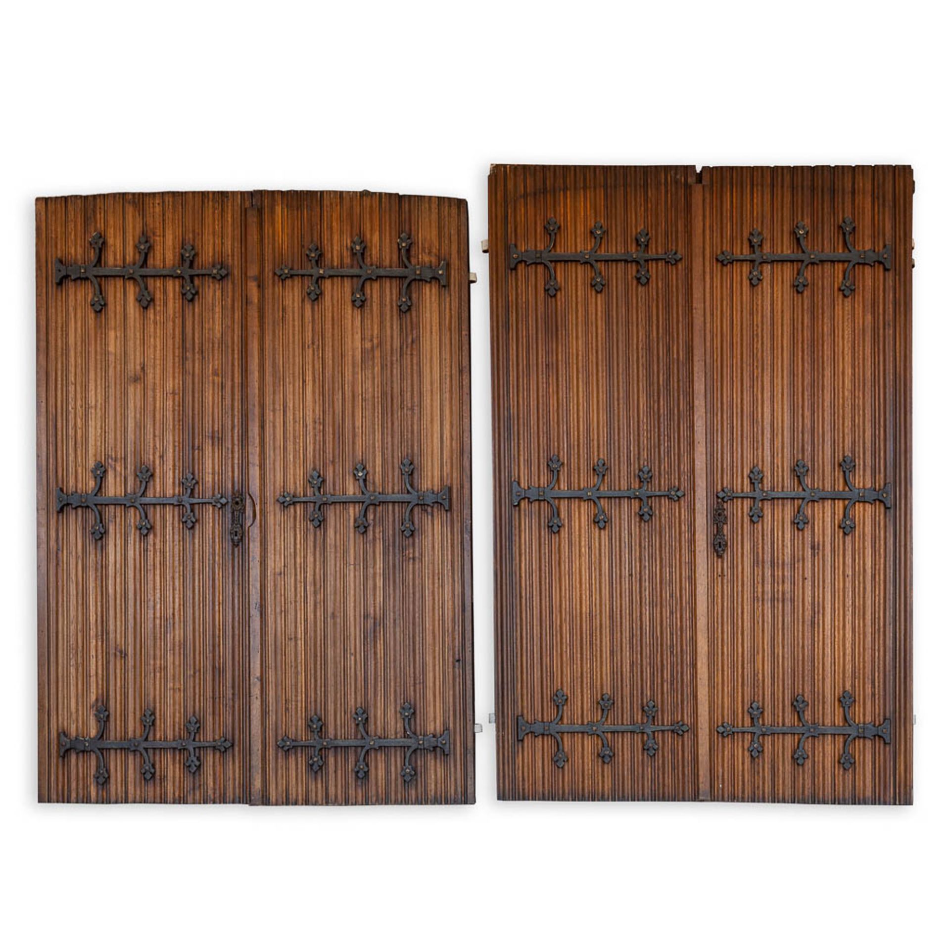 Two pairs of Gothic Revivial chapel doors with metal hardware. The first half of the 20th C. (W:160
