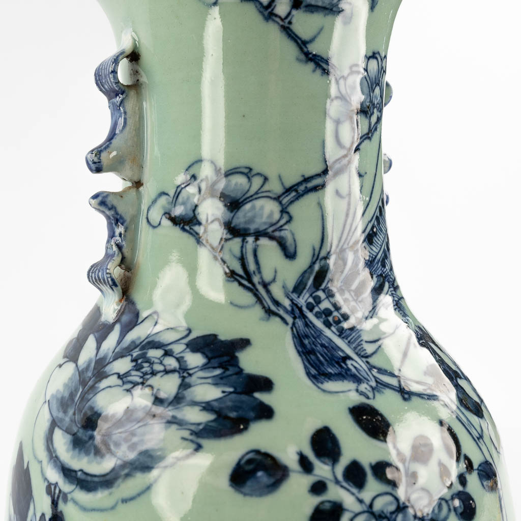 A Chinese celadon vase with blue-white decor of flora. 19th/20th C (H:42 x D:19 cm) - Image 12 of 12