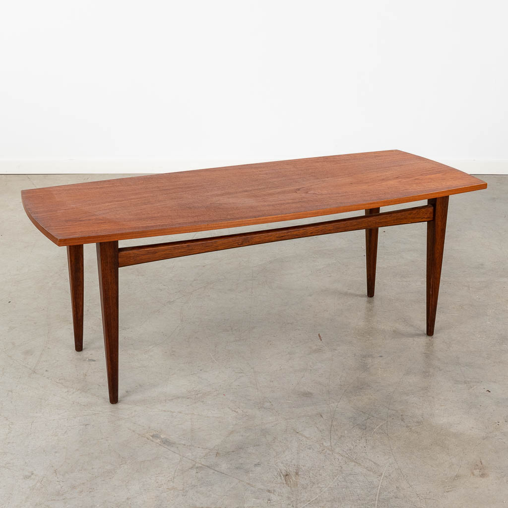 A mid-century Scandinavian coffee table, probably solid teak. (D:50 x W:120 x H:45 cm)