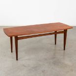 A mid-century Scandinavian coffee table, probably solid teak. (D:50 x W:120 x H:45 cm)