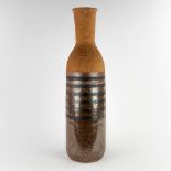 An exceptionally large, partially glazed ceramic vase. Circa 1960. (H:85,5 x D:24 cm)