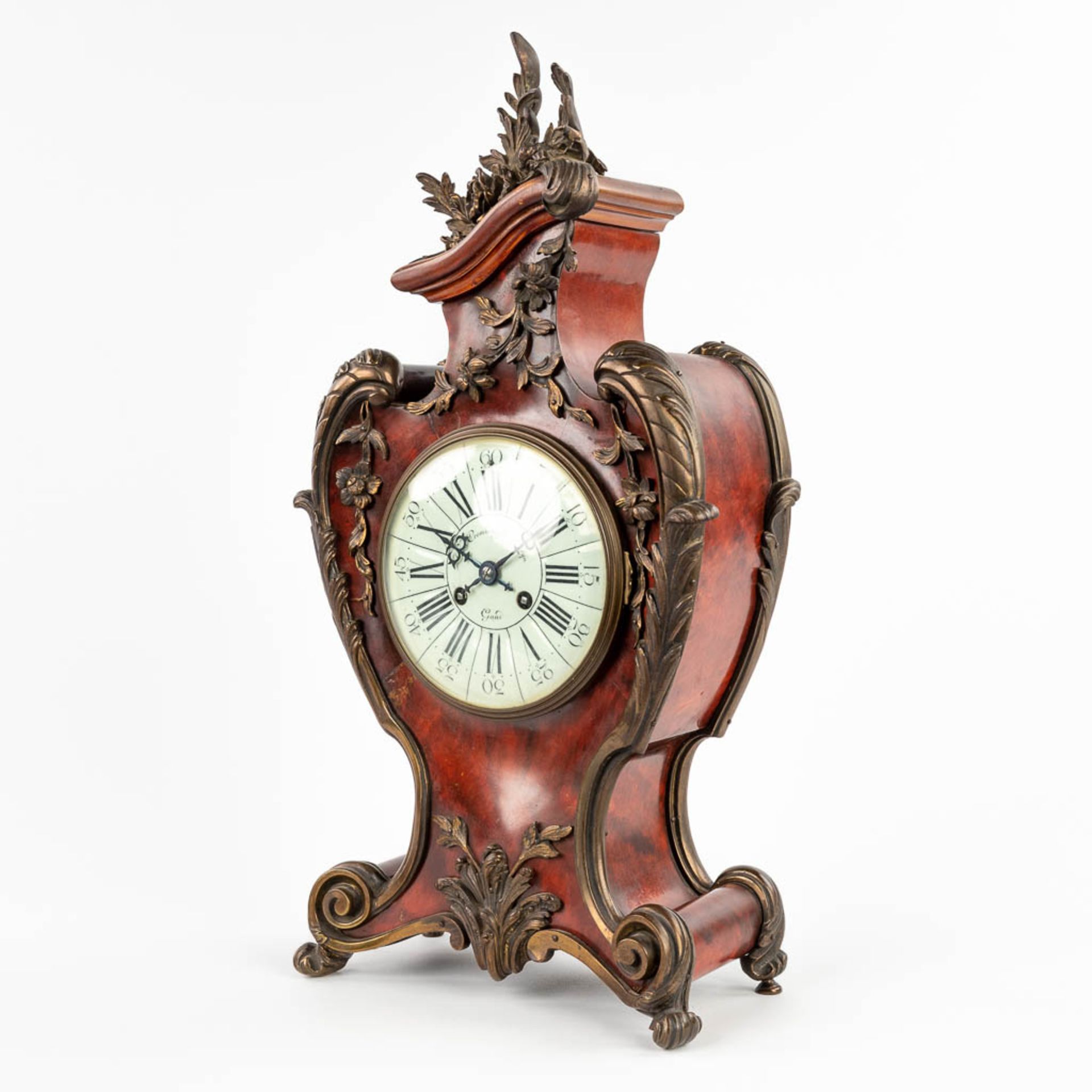 A mantle clock, tortoiseshell finished with gilt bronze in Louis XV style. 19th C. (D:14 x W:28 x H: - Bild 3 aus 12