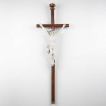 A large corpus Christi, bisque porcelain mounted on a wood cross. Circa 1900. (W:46 x H:145 cm)
