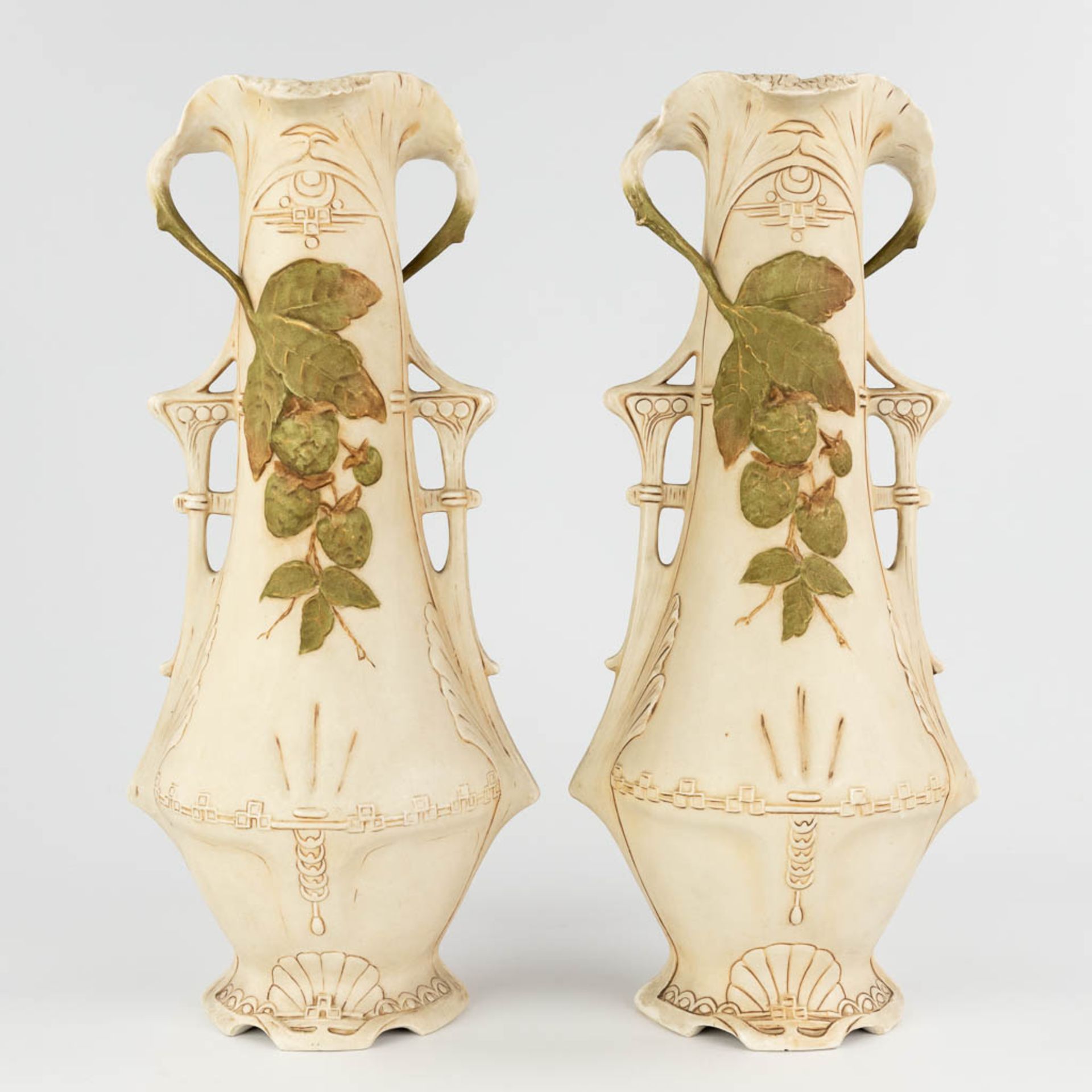 Royal Dux, a pair of faience vases, art nouveau. Circa 1900. (D:18 x W:22 x H:48 cm)