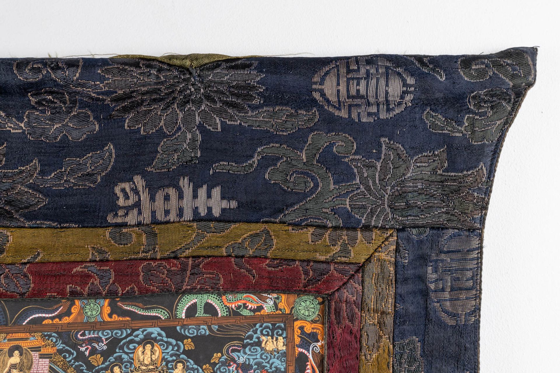 An Eastern Thangka, hand-painted decor on silk. (W:57 x H:74 cm) - Image 10 of 13