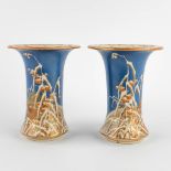 A pair of Japanese vases decorated with fauna and flora. (H:20 x D:16 cm)