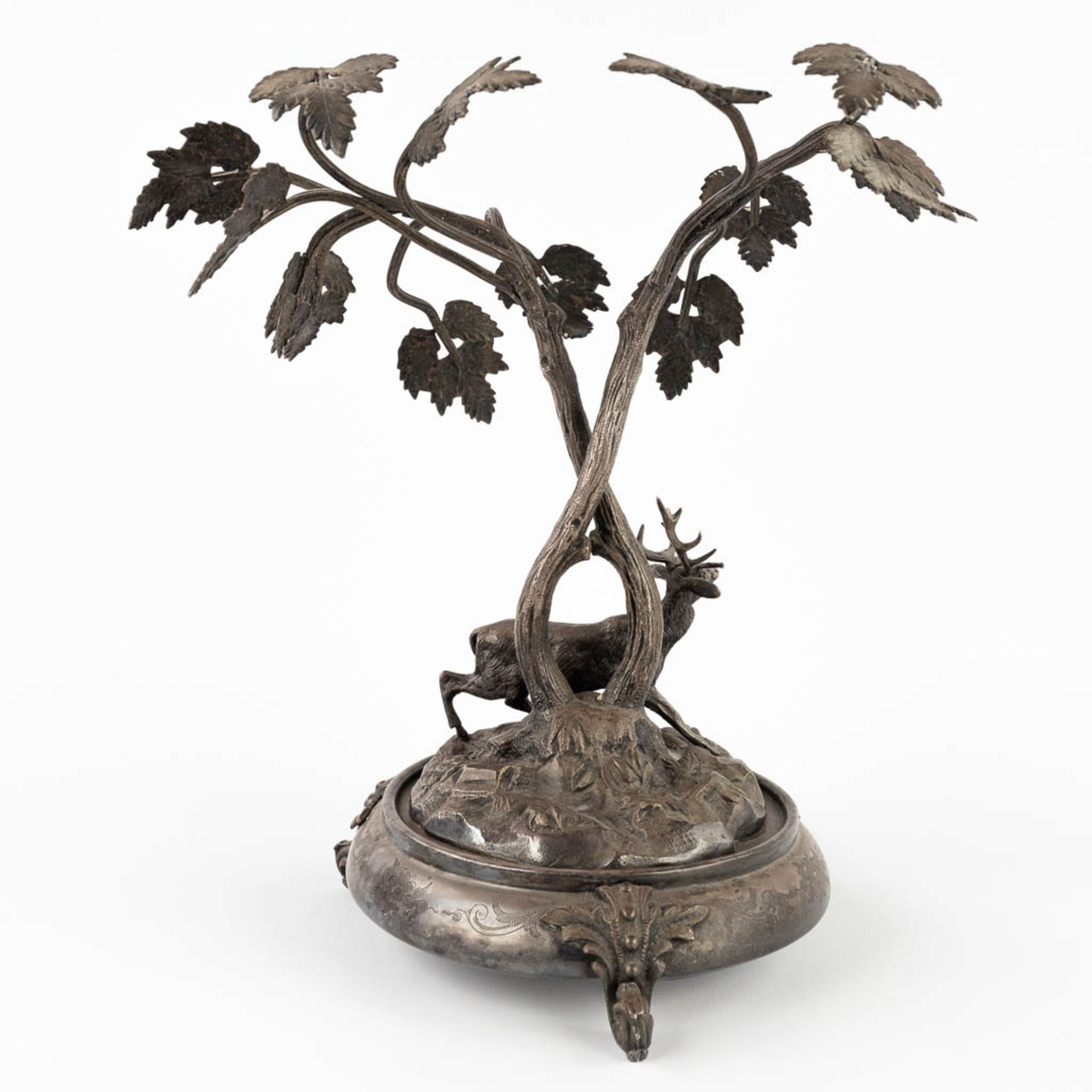 A figurine of a deer, walking under tall trees. Silver-plated bronze. Circa 1900. (D:24 x W:30 x H:3 - Image 5 of 13